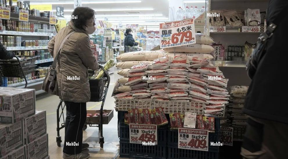 A customer shops for rice at a Marusan supermarket in Koshigaya, Saitama Prefecture.